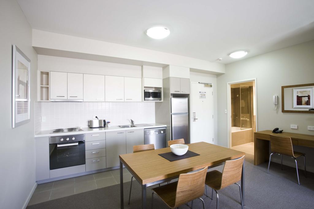 Gladstone Downtown Central Apartment Hotel Official Habitación foto